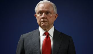 FILE - In this Oct. 15, 2018, file photo, Attorney General Jeff Sessions pauses during a news conference at the U.S. Attorney&#39;s Office for the District of Columbia in Washington. (AP Photo/Carolyn Kaster, File)