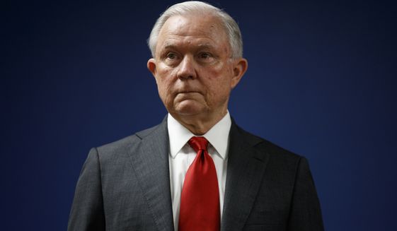 FILE - In this Oct. 15, 2018, file photo, Attorney General Jeff Sessions pauses during a news conference at the U.S. Attorney&#39;s Office for the District of Columbia in Washington. (AP Photo/Carolyn Kaster, File)