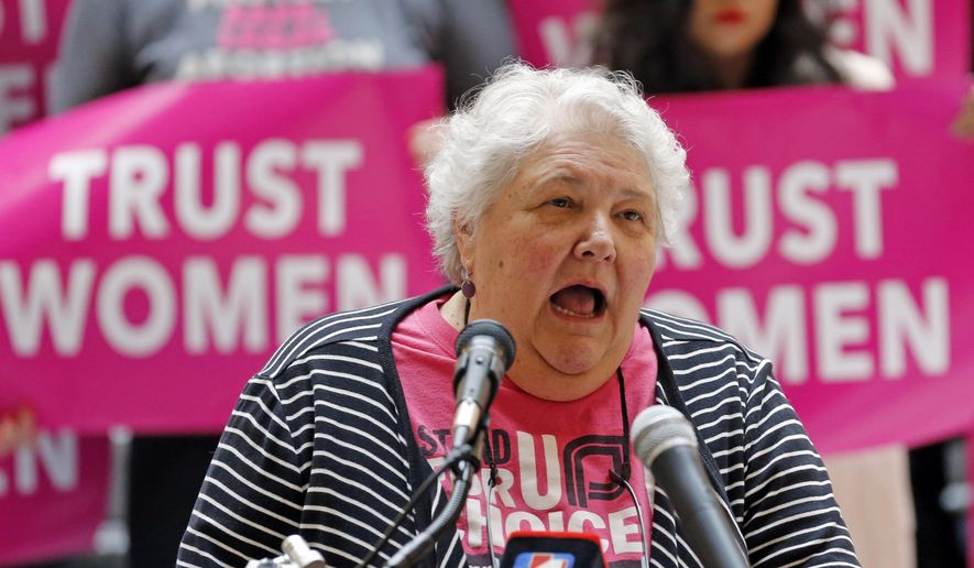 FILE - In this April 10, 2019, file photo, Karrie Galloway, of Planned Parenthood Association of Utah, speaks during a news conference at the Utah State Capitol in Salt Lake City. Abortion-rights advocates will ask a judge to block Utah's new 18-week ban from going into effect. (AP Photo/Rick Bowmer, File)