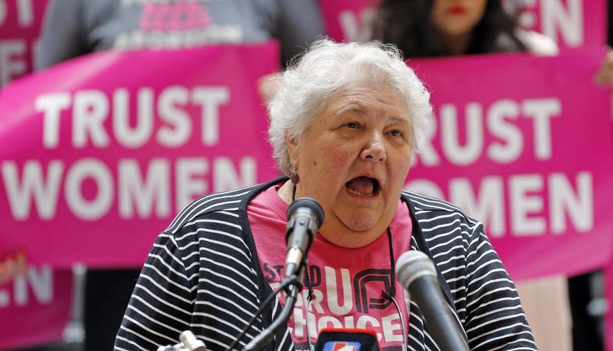 FILE - In this April 10, 2019, file photo, Karrie Galloway, of Planned Parenthood Association of Utah, speaks during a news conference at the Utah State Capitol in Salt Lake City. Abortion-rights advocates will ask a judge to block Utah's new 18-week ban from going into effect. (AP Photo/Rick Bowmer, File)