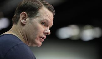 FILE- In this Feb. 27, 2019, file photo, Indianapolis Colts general manager Chris Ballard speaks during a new conference at the NFL football scouting combine in Indianapolis. Ballard enjoys these final days before the NFL draft. He pores through the tapes, meets with coaches and scouts and constantly debates where each college prospect belongs on the Colts’ board. Some see this annual ritual as a tedious, emotional grind. Ballard savors every precious moment as he prepares to step into the biggest ring of the offseason. (AP Photo/Michael Conroy, File)
