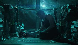 This image released by Disney shows Robert Downey Jr. in a scene from “Avengers: Endgame.” (Disney/Marvel Studios via AP)