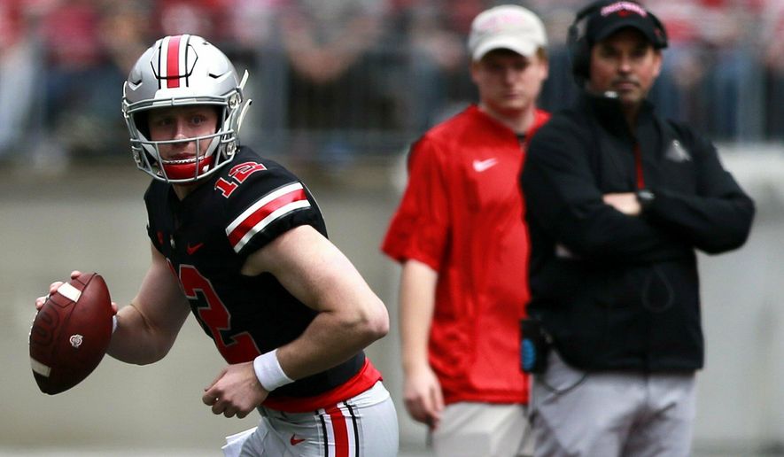 Ohio State's coach Ryan Day watches as quarterback Matthew Baldwin looks to pas during the spring NCAA college football game at the Ohio Stadium in Columbus, Ohio, Saturday April 13, 2019. (Brooke LaValley/The Columbus Dispatch via AP)