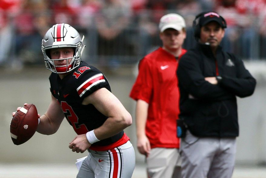 Ohio State's coach Ryan Day watches as quarterback Matthew Baldwin looks to pas during the spring NCAA college football game at the Ohio Stadium in Columbus, Ohio, Saturday April 13, 2019. (Brooke LaValley/The Columbus Dispatch via AP)