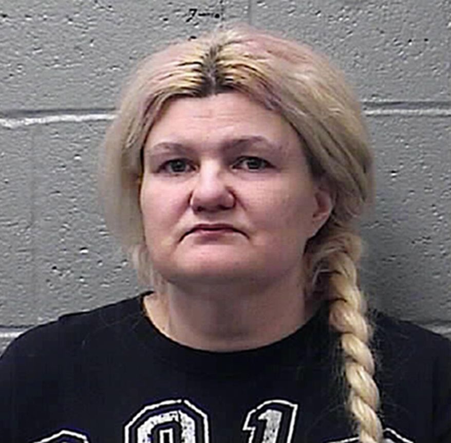 This photo provided by the St. Francois County Sheriff's Department in Farmington, Mo., shows Malissa Ancona, Ancona has admitted fatally shooting her husband, an imperial wizard in the Ku Klux Klan. The St. Louis Post-Dispatch reports that Ancona pleaded guilty Friday, April 19, 2019 to second-degree murder, tampering with evidence and abandonment of a corpse, and was sentenced to life in prison as part of a plea agreement. (St. Francois County Sheriff's Department via AP)