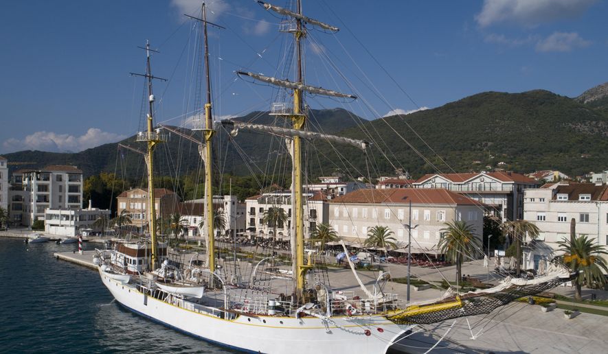 FILE - In this Sept. 6, 2018 file photo, the training vessel 'Jadran' is moored at the port of Tivat, Montenegro. Montenegrin defense ministry says the army has discovered drugs hidden on a military training ship ahead of its planned journey to Turkey and Greece. The ministry says that military police early on Friday, April 19, 2019 searched the ship called 'Jadran', or the Adriatic, after learning that certain criminal gangs were planning to use it to smuggle drugs. (AP Photo/Darko Bandic, File)