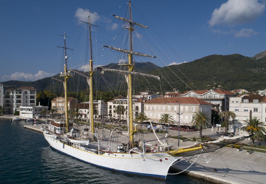 FILE - In this Sept. 6, 2018 file photo, the training vessel 'Jadran' is moored at the port of Tivat, Montenegro. Montenegrin defense ministry says the army has discovered drugs hidden on a military training ship ahead of its planned journey to Turkey and Greece. The ministry says that military police early on Friday, April 19, 2019 searched the ship called 'Jadran', or the Adriatic, after learning that certain criminal gangs were planning to use it to smuggle drugs. (AP Photo/Darko Bandic, File)