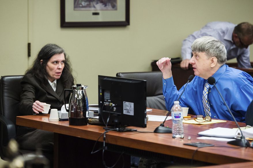 In this June 20, 2018, file photo, Louise Turpin, left, and her husband, David Turpin, right, appear for a preliminary hearing in Superior Court in Riverside, Calif. The Turpins who starved a dozen of their children and shackled some to beds face sentencing for years of abuse. The couple is due Friday, April 19, 2019, in Riverside County Superior Court for a proceeding that is largely a formality. The couple pleaded guilty in February to torture and other abuse and agreed to serve at least 25 years in prison. (Watchara Phomicinda/The Orange County Register via AP, Pool, File)