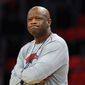 FILE - In this March 15, 2018, file photo, Arkansas head coach Mike Anderson watches practice at the NCAA college basketball tournament in Detroit. Anderson was hired as St. John&#39;s coach on Friday, April 19, 2019, after he was fired by Arkansas last month. He also had head coaching stints at Missouri and UAB before leading the Razorbacks to five postseason appearances and a 169-102 record in eight seasons. (AP Photo/Paul Sancya, File)