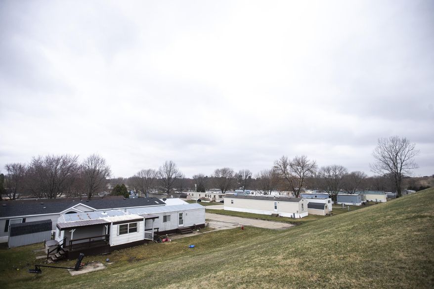 This April 5, 2019, photo shows the West Branch Village mobile home park in West Branch, Iowa. Mobile home owners who for years have enjoyed some immunity from rising housing costs are increasingly finding themselves subjected to massive rent increases, not just in Iowa, but across the country. (Joseph Cress/Iowa City Press-Citizen via AP)