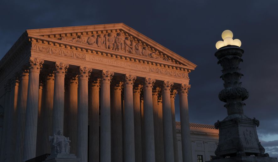 FILE - In this Jan. 24, 2019, file photo, the Supreme Court is seen at sunset in Washington. Vast changes in America and technology have dramatically altered how the census is conducted. But the accuracy of the once-a-decade population count is at the heart of the Supreme Court case over the Trump administration’s effort to add a citizenship question to the 2020 census. The justices hear arguments in the case Tuesday, April 23. (AP Photo/J. Scott Applewhite, File)