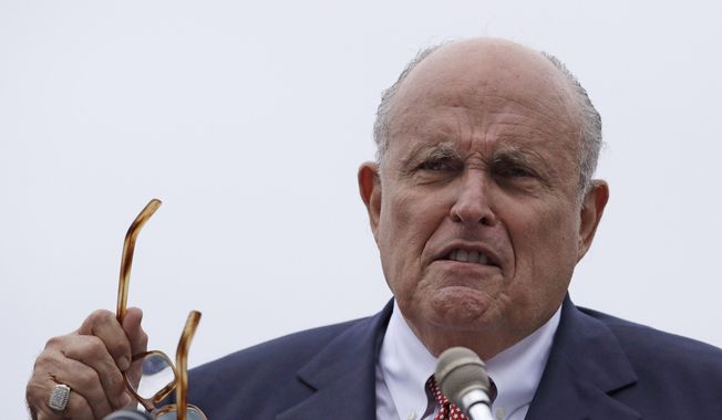 In this Aug. 1, 2018, file photo, Rudy Giuliani, an attorney for President Donald Trump, speaks in Portsmouth, N.H.  (AP Photo/Charles Krupa, File) ** FILE **
