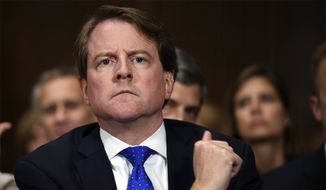 In this Sept. 27, 2018, file photo, White House counsel Don McGahn listens as Supreme court nominee Brett Kavanaugh testifies before the Senate Judiciary Committee on Capitol Hill in Washington. Rep. Jerrold Nadler, the chairman of the House Judiciary Committee has subpoenaed McGahn for testimony following the release of the report from special counsel Robert Mueller. (Saul Loeb/Pool Photo via AP, File)