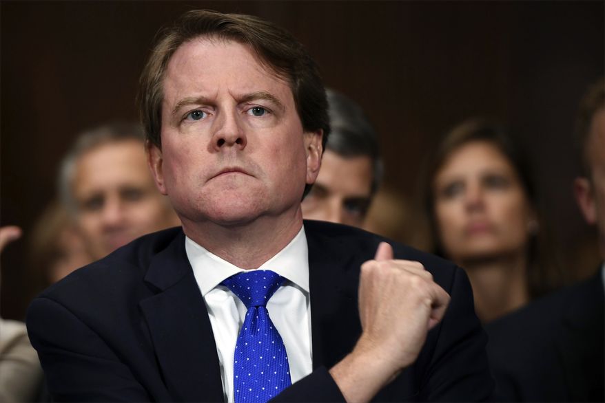 In this Sept. 27, 2018, file photo, White House counsel Don McGahn listens as Supreme court nominee Brett Kavanaugh testifies before the Senate Judiciary Committee on Capitol Hill in Washington. Rep. Jerrold Nadler, the chairman of the House Judiciary Committee has subpoenaed McGahn for testimony following the release of the report from special counsel Robert Mueller. (Saul Loeb/Pool Photo via AP, File)