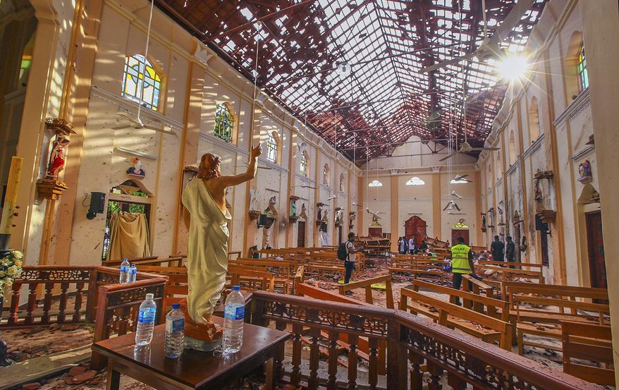 In this Sunday, April 21, 2019, a view of St. Sebastian's Church damaged in blast in Negombo, north of Colombo, Sri Lanka. Sri Lankan authorities blame seven suicide bombers of a domestic militant group for coordinated Easter bombings that ripped through Sri Lankan churches and luxury hotels which killed and injured hundreds of people. It was Sri Lanka's deadliest violence since a devastating civil war in the South Asian island nation ended a decade ago. (AP Photo/Chamila Karunarathne, file)