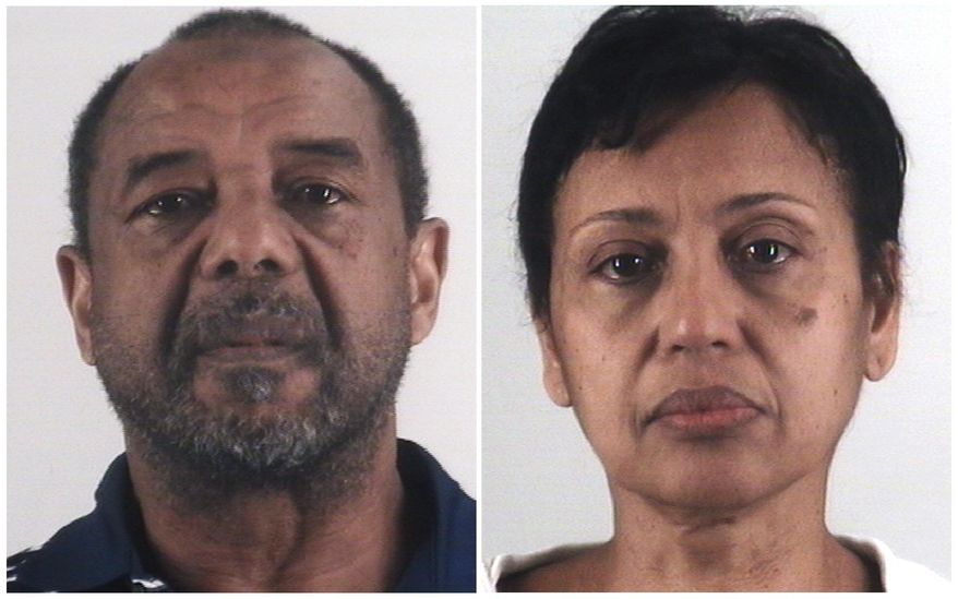 This combination of photos provided by the Tarrant County Sheriff's Department in Texas shows Mohamed Toure, left, and Denise Cros-Toure, a Fort Worth couple accused of enslaving a Guinean woman for 16 years. The couple on Monday, April 22, 2019, was sentenced to seven years in federal prison each for enslaving the woman for 16 years. (Tarrant County Sheriff's Department via AP)