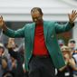 Tiger Woods smiles as he wears his green jacket after winning the Masters golf tournament Sunday, April 14, 2019, in Augusta, Ga. (AP Photo/Matt Slocum)