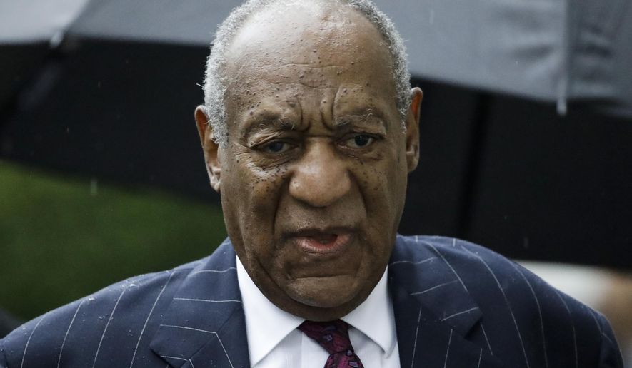 FILE - In this Sept. 25, 2018, file photo, Bill Cosby arrives for his sentencing hearing at the Montgomery County Courthouse in Norristown Pa. A fee dispute between Cosby and a Los Angeles law firm shows the firm billed him about $1 million a month in the run-up to his first sex assault trial. The 81-year-old Cosby is challenging a California arbitration award that trims the $9 million bill from Quinn Emanuel Urquhart and Sullivan to below $7 million. (AP Photo/Matt Rourke, File)