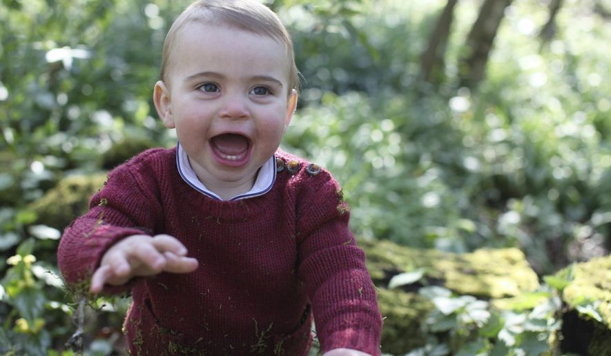 This photo released by Kensington Palace on Monday April 22, 2019, and taken by Kate, Duchess of Cambridge, shows Prince Louis at their home in Norfolk, England, to mark his first birthday on Tuesday. (Duchess of Cambridge/Kensington Palace via AP)