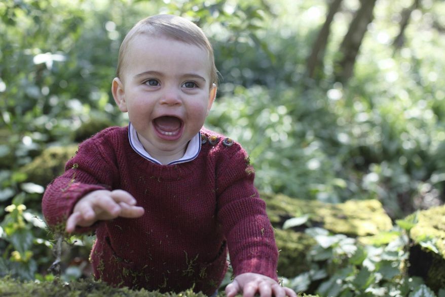This photo released by Kensington Palace on Monday April 22, 2019, and taken by Kate, Duchess of Cambridge, shows Prince Louis at their home in Norfolk, England, to mark his first birthday on Tuesday. (Duchess of Cambridge/Kensington Palace via AP)