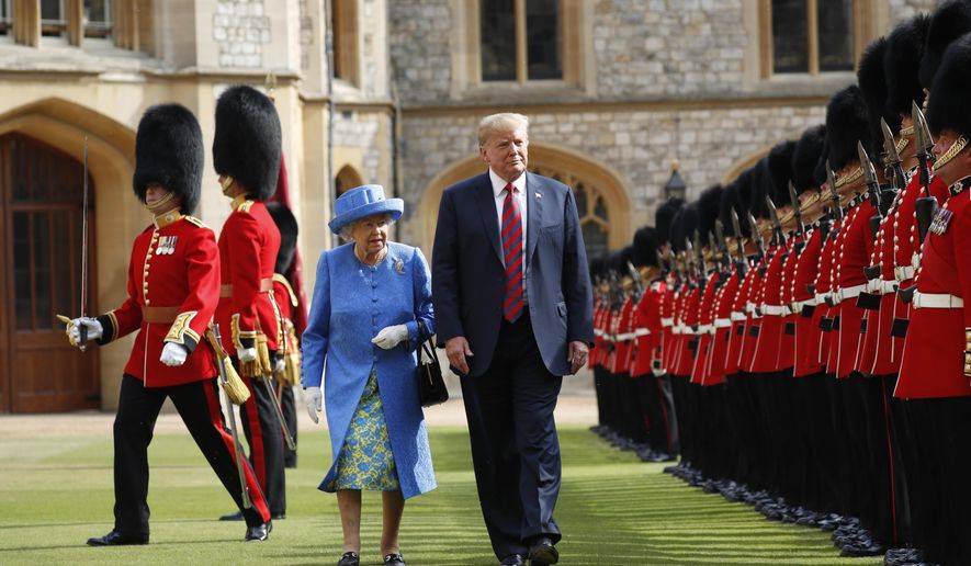 FILE - In this Friday, July 13, 2018 file photo, U.S. President Donald Trump and Britain's Queen Elizabeth inspects the Guard of Honour at Windsor Castle in Windsor, England. U.S. President Donald Trump will pay a state visit to Britain in June as a guest of Queen Elizabeth II, Buckingham Palace said Tuesday, April 23, 2019. The palace said Trump and his wife, Melania, had accepted an invitation from the queen for a visit that will take place June 3-5. (AP Photo/Pablo Martinez Monsivais, file)