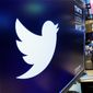 The logo for Twitter is displayed above a trading post on the floor of the New York Stock Exchange. (AP Photo/Richard Drew, File)