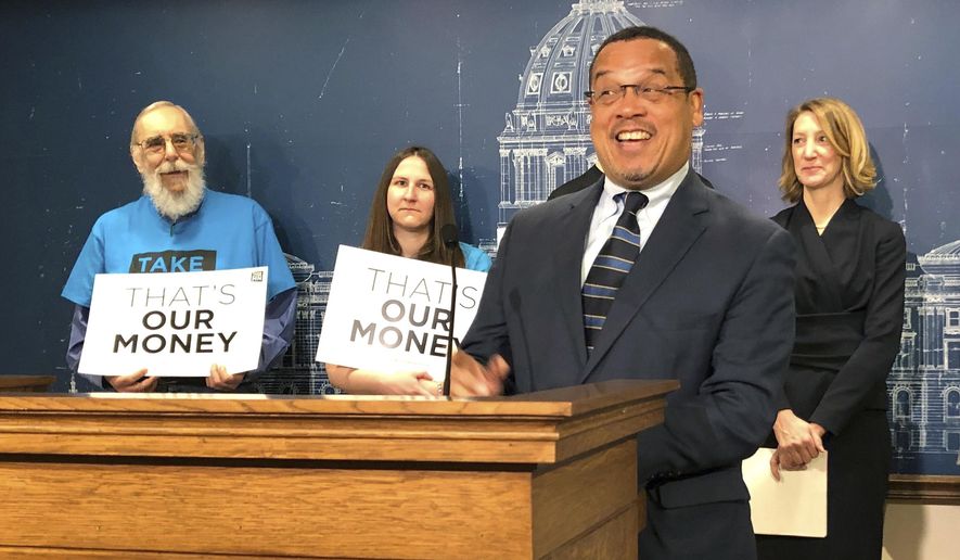 Minnesota Attorney General Keith Ellison speaks at a news conference at the state Capitol in St. Paul, Minnesota, Tuesday, April 23, 2019, about the impact of a 2017 state law repealing the state&#x27;s ban on for-profit health insurance companies. (AP Photo/Steve Karnowski) **FILE**