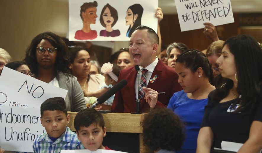 Rep. Carlos Guillermo Smith (D-Orlando) speaks out against Family Separation Bills HB 527 and SB 168 Tuesday, April 23, 2019, during a press conference in the Florida Capitol in Tallahassee, Fla. (AP Photo/Phil Sears)