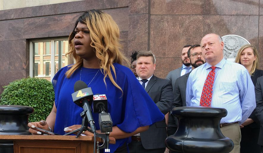 Lead plaintiff Kayla Gore speaks at a news conference outside the federal courthouse in Nashville, Tenn., Tuesday, April 23, 2019. She announced a lawsuit challenging a Tennessee statute that prohibits transgender people from changing the gender listed on their birth certificates. (AP Photo/Travis Loller)