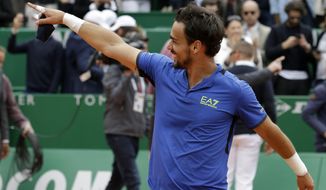 Italy&#39;s Fabio Fognini celebrates after defeating Serbia&#39;s Dusan Lajovic in the men&#39;s singles final match of the Monte Carlo Tennis Masters tournament in Monaco, Sunday, April, 21, 2019. (AP Photo/Claude Paris)