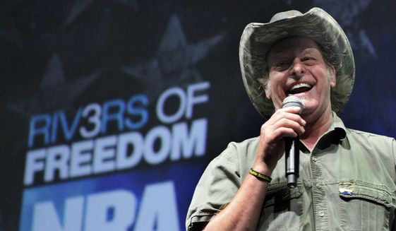 In this May 1, 2011, photo, musician and gun rights activist Ted Nugent addresses a seminar at the National Rifle Association&#x27;s 140th convention in Pittsburgh. (AP Photo/Gene J. Puskar)