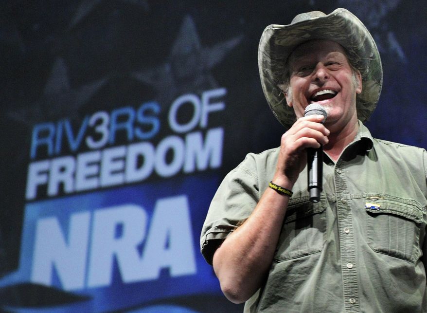 In this May 1, 2011, photo, musician and gun rights activist Ted Nugent addresses a seminar at the National Rifle Association&#x27;s 140th convention in Pittsburgh. (AP Photo/Gene J. Puskar)
