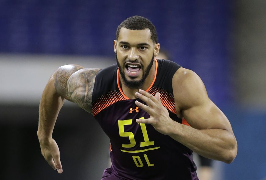 Mississippi State defensive lineman Montez Sweat runs a drill during the NFL football scouting combine, in Indianapolis. Sweat is a possible pick in the 2019 NFL Draft. (AP Photo/Darron Cummings, File)