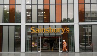 FILE- This April 30, 2018, file photo shows an exterior view of the Sainsbury&#39;s flagship store in the Nine Elms area of London. British competition regulators have blocked J. Sainsbury Plc&#39;s 7.3 billion-pound ($9.4 billion) purchase of Walmart&#39;s Asda unit, which would have created the U.K.&#39;s biggest supermarket chain. The Competition and Markets Authority says the deal would have increased prices and reduced the quality and range of products available to shoppers, it was reported on Thursday, April 25, 2019. (AP Photo/Matt Dunham, File)