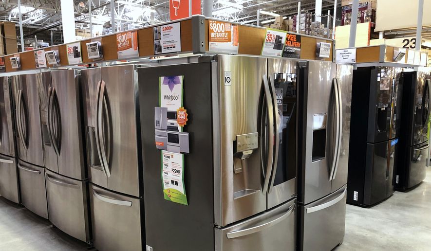 In this Tuesday, April 23, 2019, file photo, refrigerators are shown for sale at a Home Depot store in Miami Lakes, Fla. (AP Photo/Wilfredo Lee) ** FILE **