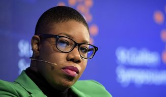 In this May 5, 2017 file photo, Symone Sanders, former national press secretary for Bernie Sanders, attends the St. Gallen Symposium, at the University of St. Gallen, Switzerland. Joe Biden has hired Symone Sanders, a prominent African American political strategist, as a senior adviser to his newly launched presidential campaign. The move adds a younger, diverse voice to Biden’s cadre of top advisers, which has been dominated by older white men. It suggests Biden is seeking to broaden his appeal to a new generation of Democrats. (Gian Ehrenzeller/Keystone via AP)