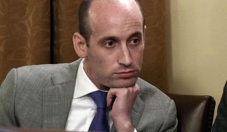 In this June 21, 2018, file photo, White House senior adviser Stephen Miller listens as President Donald Trump speaks during a Cabinet meeting at the White House in Washington. (AP Photo/Evan Vucci, File)