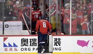 Washington Capitals left wing Alex Ovechkin (8), of Russia, leaves the ice after Game 7 of an NHL hockey first-round playoff series against the Carolina Hurricanes, Wednesday, April 24, 2019, in Washington. The Hurricanes won 4-3 in double overtime. (AP Photo/Nick Wass)