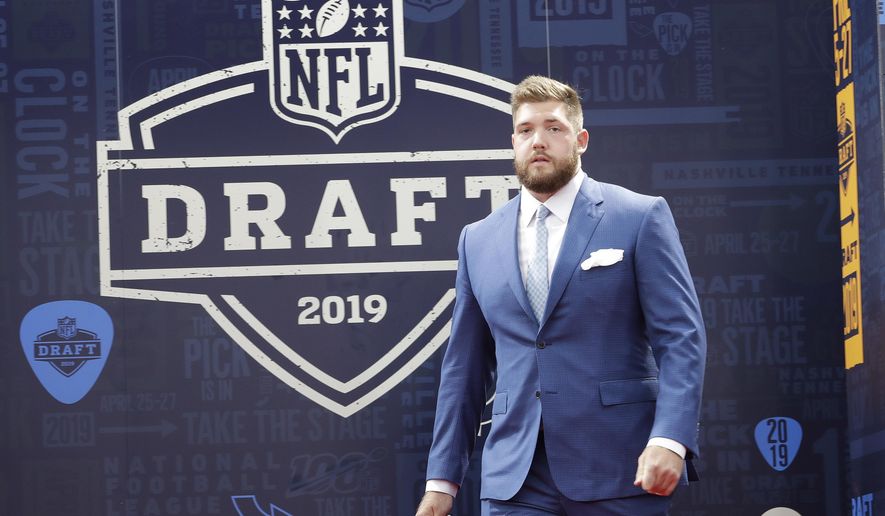 Alabama tackle Jonah Williams walks the red carpet ahead of the first round at the NFL football draft, Thursday, April 25, 2019, in Nashville, Tenn. (AP Photo/Steve Helber)