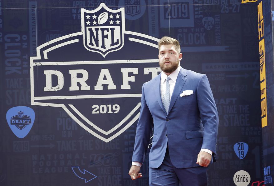 Alabama tackle Jonah Williams walks the red carpet ahead of the first round at the NFL football draft, Thursday, April 25, 2019, in Nashville, Tenn. (AP Photo/Steve Helber)