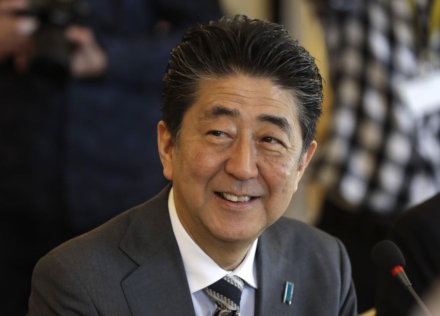 Japan&#39;s Prime Minister Shinzo Abe arrives at the V4+Japan summit in Bratislava, Slovakia, Thursday, April 25, 2019. (AP Photo/Petr David Josek)