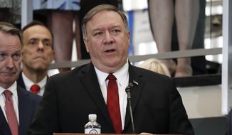 Secretary of State Mike Pompeo announces a new &quot;ethos&quot; statement as he addresses employees in the lobby staircase of the U.S. State Department headquarters in Washington, Friday, April 25, 2019. (AP Photo/Pablo Martinez Monsivais) ** FILE **
