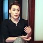 In this frame grab taken from the Associated Press Television footage on Friday, April 26, 2019, Lilit Martirosian, a founder of the Armenian transgender organization Right Side, gestures while her interview for the Associated Press in Yerevan, Armenia. A transgender woman whose address to the Armenian parliament caused an uproar says she has received death threats and is avoiding leaving her home because of security concerns. (AP Photo/Sona Kocharyan)