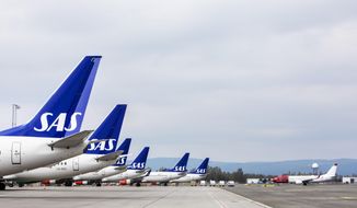SAS planes are seen grounded at Oslo Gardermoen airport during pilots strikes, in Oslo, Friday, April 26, 2019. Pilots for Scandinavian Airlines have launched an open-ended strike following the collapse of pay negotiations, forcing the company to cancel almost all its flights. So far, 673 flights have been canceled, affecting 72,000 passengers. The Stockholm-based carrier said talks on a new collective bargaining agreement with the SAS Pilot Group, which represents 95% of the company&#39;s pilots in Sweden, Denmark and Norway, collapsed early Friday. (Ole Berg-Rusten/NTB Scanpix via AP)