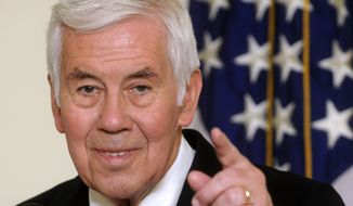 FILE - In a  Jan. 16, 2008 file photo, U.S. Senator Richard Lugar, R-Ind., chairman of the U.S. Senate&#39;s Foreign Relations Committee, points during a press conference in Kiev, Ukraine. Former Indiana Sen. Richard Lugar, a Republican foreign policy sage known for leading efforts to help the former Soviet states dismantle and secure much of their nuclear arsenal, died Sunday, April 28, 2019 at the Inova Fairfax Heart and Vascular Institute in Virginia. He was 87. (AP Photo/Sergei Chuzavkov, File)