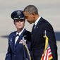 Colonial Kristin Goodwin, Vice Commander of the 509th Bomb Wing, left, walks with President Barack Obama after arriving at Whiteman Air Force Base in Knob Noster, Mo., Wednesday, July 24, 2013. Obama is traveling to the University of Central Missouri to deliver a speech focusing on the economy.  (AP Photo/Colin E. Braley)