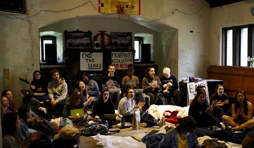 Swarthmore College students sing during a sit-in at the Phi Psi fraternity house, Monday, April 29, 2019, in Swarthmore, Pa. Students at the suburban Philadelphia college have occupied the on-campus fraternity house in an effort to get it shut down after documents allegedly belonging to Phi Psi surfaced this month containing derogatory comments about women and the LGBTQ community and jokes about sexual assault. (AP Photo)