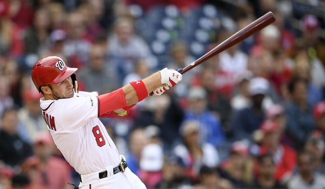 Washington Nationals&#x27; Carter Kieboom bats during a baseball game against the San Diego Padres, Saturday, April 27, 2019, in Washington. The Padres won 8-3 in ten innings. (AP Photo/Nick Wass)