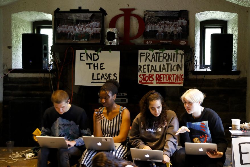 Swarthmore College students gather at the Phi Psi fraternity house during a sit-in, Monday, April 29, 2019, in Swarthmore, Pa. Students at the suburban Philadelphia college have occupied the on-campus fraternity house in an effort to get it shut down after documents allegedly belonging to Phi Psi surfaced this month containing derogatory comments about women and the LGBTQ community and jokes about sexual assault. (AP Photo)