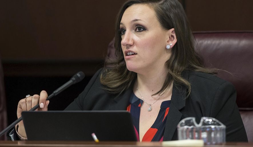 FILE - In this Feb. 9, 2017 file photo, state Sen. Nicole Cannizzaro, D-Las Vegas, listens to testimony during the Nevada legislative session in Carson City, Nev. Lawyers assigned to defend Alonso Perez, who is facing a death penalty trial in Las Vegas, are challenging Nevada's capital punishment law using an unusual argument. They blame the two most powerful Democrats in the state Senate and Assembly for killing discussion about two measures that aimed to repeal the death penalty as out-of-touch with today's voters and too expensive to continue. (Benjamin Hager/Las Vegas Review-Journal via AP, File)